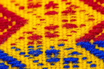 Fototapeta premium Woven rug patterns, hand-woven rug carpet, multicolored hand-woven fabric, regional pattern,