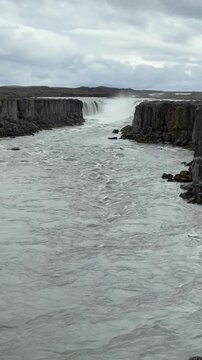 Beautiful cinematic footage of the massive Godafoss waterfall in Iceland, la waterfall of the gods -Go&eth;afoss	
