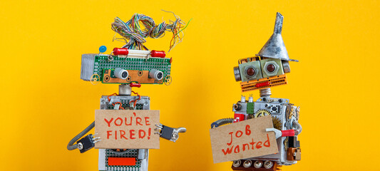 Chief robot dismisses personnel and shows cardboard sign text You are fired. Second robot is...