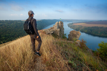 Breathtaking panoramic view of the Dniester River and Shyshkovi Horby hills in Nagoryany, Ukraine. High angle aerial view of the picturesque Dniester canyon with unique limestone rock formations .