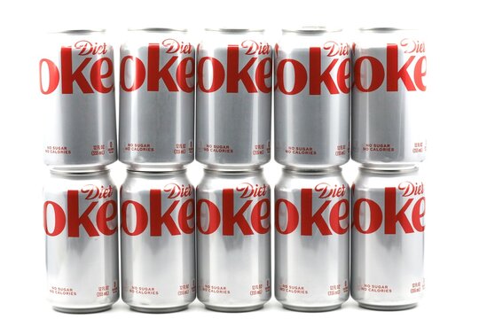 Cans of diet coke. founded in 1886, coca-cola, or coke is a carbonated soft drink manufactured by the coca-cola company.