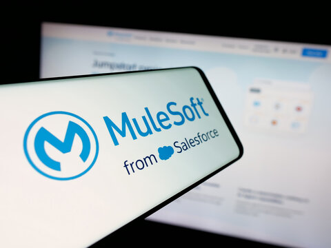 Stuttgart, Germany - 01-26-2026: Smartphone with logo of US integration software company MuleSoft LLC on screen in front of website. Focus on center-left of phone display.