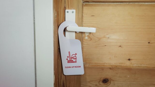 CLEAN UP ROOM Sign Placed On Door Handle During Service Routine