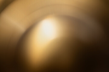 Abstract golden background of metal surface for modern backdrop.