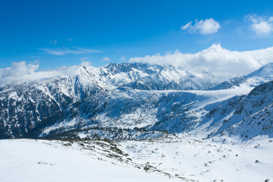View on top of Pirin mountains from cable car, ski resort Bansko, Bulgaria.