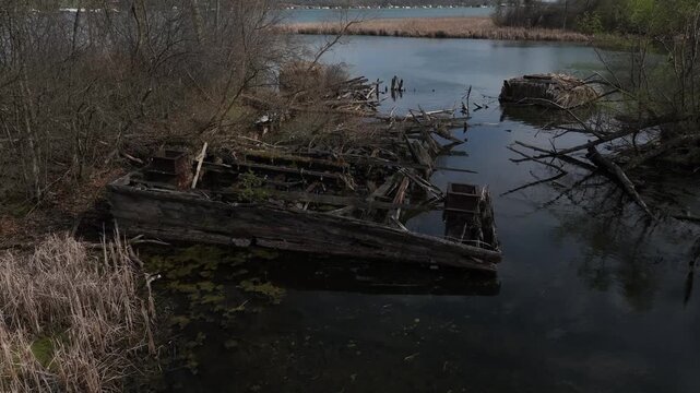 Abandoned iron works and wooden docks on Cayuga Lake in central New York State within the Montezuma wildlife preserve