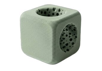 Minimalist cube with porous openings on white background