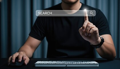 Man interacting with a search bar on a computer screen