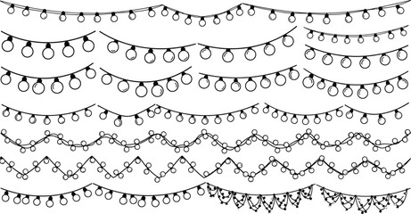 Obraz premium Variety of festive garlands and string lights on white background for decoration