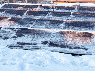 Solar panels in the snow. Generating electricity during winter. Clean