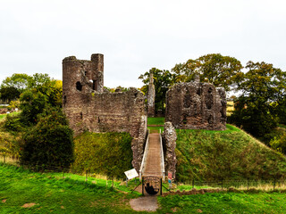 Autumn Colours over ruins of Grosmont Castle from a drone, Grosmont, Monmouthshire, Wales, UK	