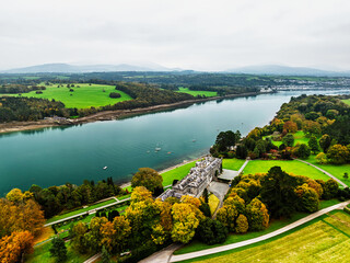 Autumn over Plas Newydd House from a drone, Gardens and Parkland, Llanfairpwllgwyngyll, Anglesey, Wales, UK