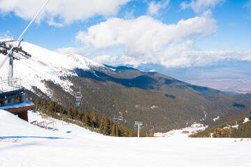BANSKO, BULGARIA - FEBRAURY 22, 2024: cable car in mountains in ski resort Bansko.