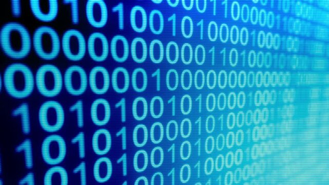 Close-up of binary code on a digital screen
