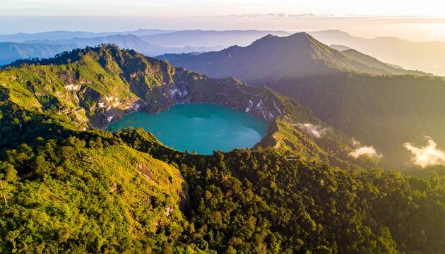 Aerial view of Kelimutu Crater Lakes, Flores Island, Indonesia at sunrise.