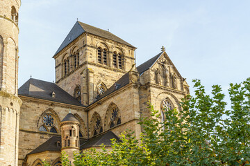 Fototapeta premium Liebfrauen basilica Catholic Church in Trier city in Germany The building has many square towers of various sizes. The building is made of stone