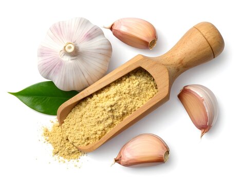 Wooden scoop of ginger powder with sliced garlic on a white background