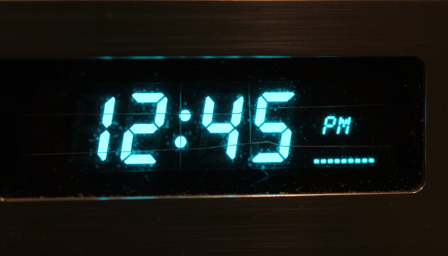 Vintage vacuum fluorescent display VFD macro with glowing cyan numbers