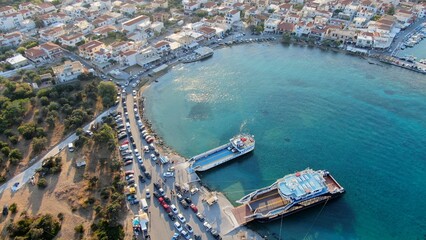 Fototapeta premium Aerial view of Elafonisos port with ferry boats and turquoise waters, Peloponnese, Greece