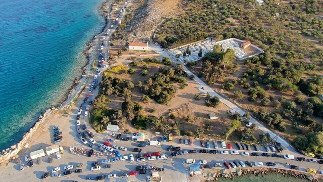 defaultAerial view of Elafonisos port with ferry boats and turquoise waters, Peloponnese, Greece.