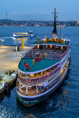 Fototapeta premium Istanbul, Turkey - December 21, 2025: Kabatas Transfer Center in Istanbul, Turkey. Ferry and boat pier.