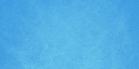 Naklejka premium A vintage blue wall background features a rough textured paper pattern with a turquoise grunge surface design reminiscent of an old canvas or a light pool water backdrop