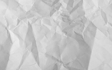 Fototapeta premium Old crumpled paper sheet with torn edges and weathered texture. Blank white background ideal effect.