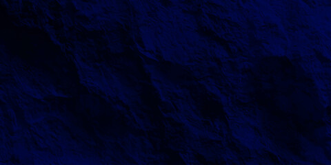 Fototapeta premium A dark blue grunge background with a textured paint surface and vintage paper material creates a rough old wall pattern for an art backdrop