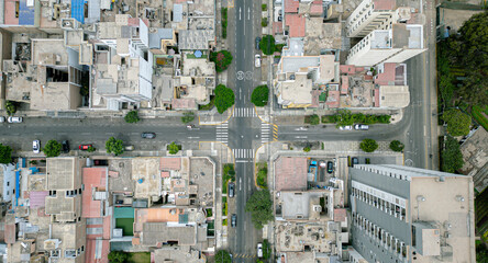 Bird&rsquo;s eye view of residential neighborhood streets and road markings.