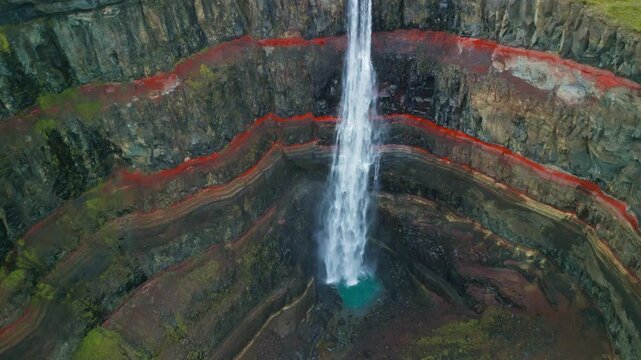 Aerial drone view of Hengifoss waterfall landscape in Iceland.