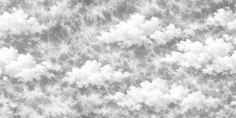 An abstract black and white cloudscape background captures a beautiful natural atmosphere of fluffy white clouds across a clear summer sky landscape