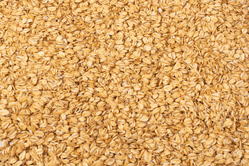 Oat-flakes as a background. Top view.