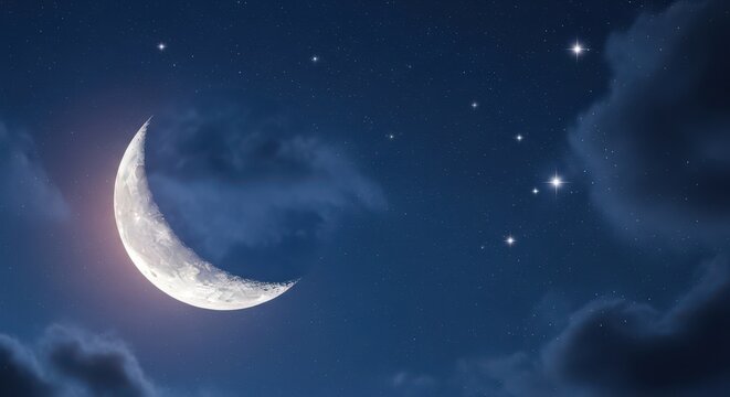 Crescent moon shining brightly in the night sky