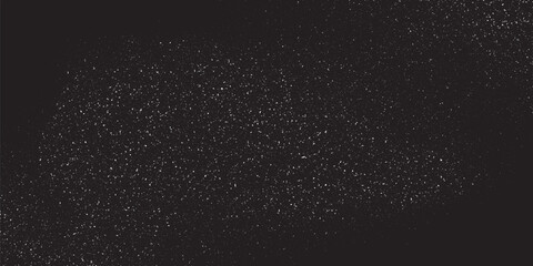 Obraz premium Abstract starry night sky background with white stipple grain texture on black.