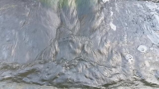 Continuous Flow Of Clean Clarified Water Exiting The Sedimentation Tank And Moving Through Concrete Channels At A Water Supply Facility
