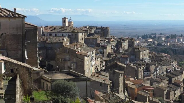 Panoramic view of Caprarola, an historic Italian village in Northern Lazio's Tuscia region, nestled on a volcanic spur of the Cimini Mountains, famous for Palazzo Farnese and hazelnut production