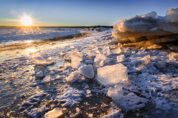 Ice toros on the Baltic Sea beach in Mikoszewo at sunrise. Poland