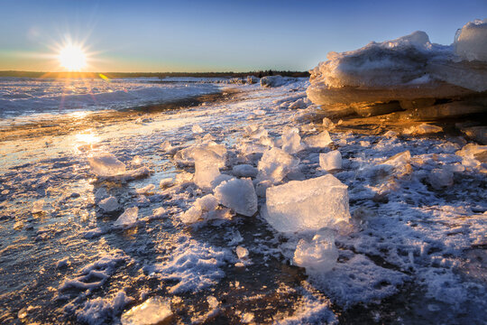 Ice toros on the Baltic Sea beach in Mikoszewo at sunrise. Poland