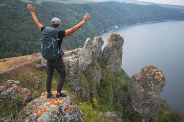 Breathtaking panoramic view of the Dniester River and Shyshkovi Horby hills in Nagoryany, Ukraine. High angle aerial view of the picturesque Dniester canyon with unique limestone rock formations .