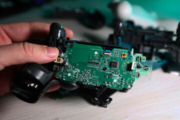Repairing game controller joystick, gaming maintenance and electronics repair © mrkotov