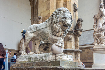 Lion sculpture in Loggia dei Lanzi on Signoria square, Florence, Italy