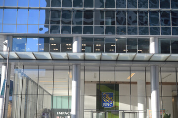 Obraz premium near street level view of RBC WaterPark Place with corporate logo located at 88 Queens Quay W, Toronto