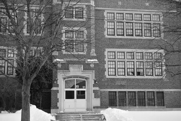 Naklejka premium black and white view of the original Runnymede Collegiate Institute designed by Charles Wellington Smith, 1927, Toronto