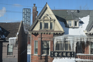 Obraz premium historic semi-detached house complex at 346-344 Dundas St W, built in 1896, in Queen Anne Style, Toronto