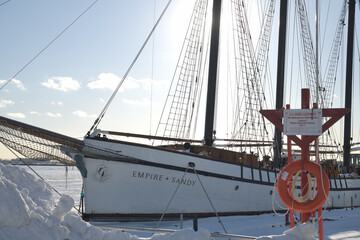 Naklejka premium The Empire Sandy, a large passenger sailing ship, moored in Toronto Harbor in winter