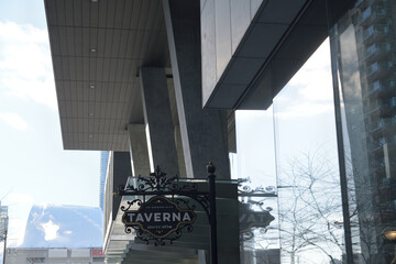 Naklejka premium projecting sign outside Taverna Mercatto, an Italian restaurant, located at 120 Bremner Blvd in Southcore Financial Centre, Toronto