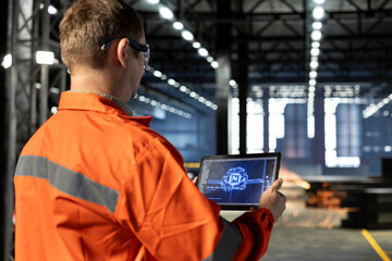 Technician controls automation machinery guided by AI and machine learning, managing industrial...