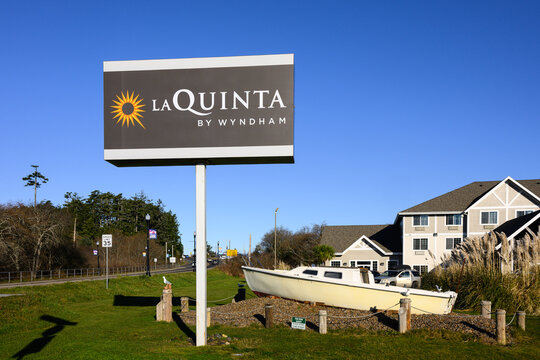 Newport, OR, USA - January 18, 2026; La Quinta by Wyndham accommodation signpost alongside Highway 101 in Newport Oregon