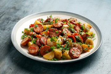 Fototapeta premium Roasted Potato and Sausage in a plate