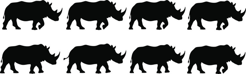 Rhino silhouette collection showing black rhinoceros shapes in walking poses, perfect for wildlife logos, safari designs, conservation graphics, and vector illustration projects © Arman's World